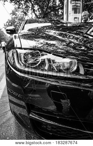 BERLIN - JUNE 14 2015: Fragment of the compact executive car Jaguar XE 20D (since 2015). Black and white. The Classic Days on Kurfuerstendamm.