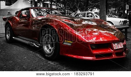 BERLIN - JUNE 14 2015: Sports car Chevrolet Corvette C3 Stingray coupe. Stylization. Toning. The Classic Days on Kurfuerstendamm.