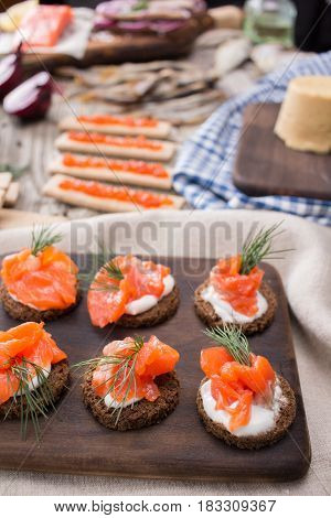 Still life - traditional Norwegian cuisine - Brunost and fish