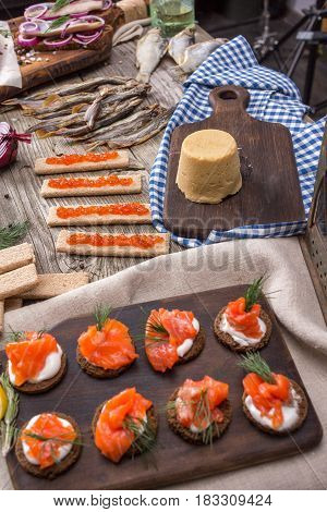 Still life - traditional Norwegian cuisine - Brunost and fish