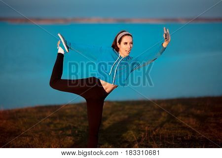 Girl in Yoga Pose Taking a Selfie Outside in Nature