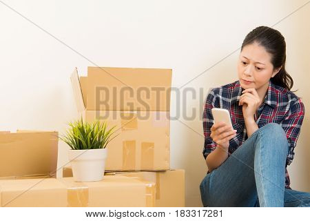 Woman Using Smartphone To Research