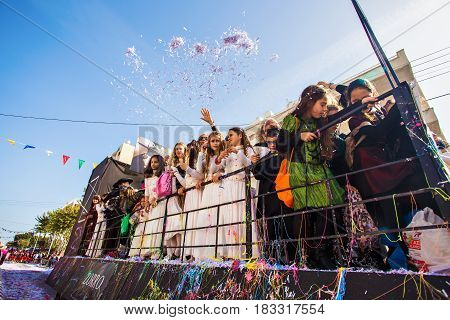 LIMASSOL, CYPRUS - FEBRUARY 26: Grand Carnival Parade - an unidentified people of all ages , gender and nationality in colorful costumes during the street carnival