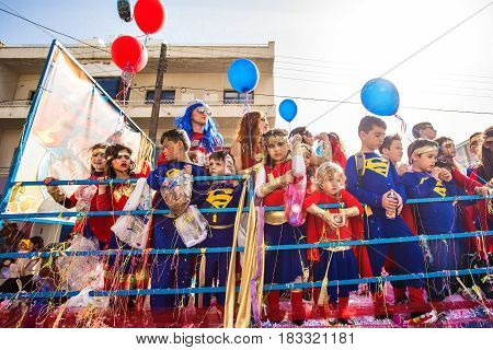 LIMASSOL, CYPRUS - FEBRUARY 26: Grand Carnival Parade - an unidentified people of all ages , gender and nationality in colorful costumes during the street carnival