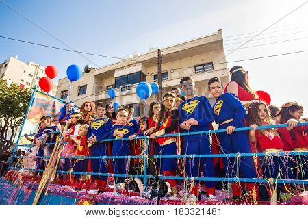 LIMASSOL, CYPRUS - FEBRUARY 26: Grand Carnival Parade - an unidentified people of all ages , gender and nationality in colorful costumes during the street carnival