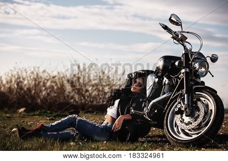 Beautiful Motorcycle Brunette Woman With A Classic Motorcycle (cinema Bleach Bypass Effect)