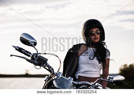 Beautiful Motorcycle Brunette Woman With A Classic Motorcycle (cinema Bleach Bypass Effect)