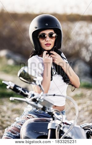 Beautiful Motorcycle Brunette Woman With A Classic Motorcycle (cinema Bleach Bypass Effect)