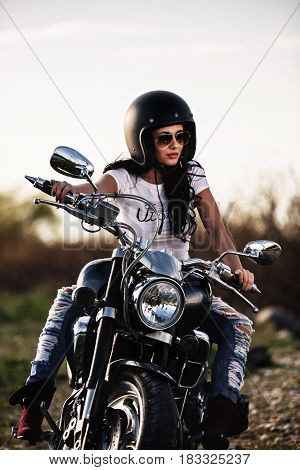 Beautiful Motorcycle Brunette Woman With A Classic Motorcycle (cinema Bleach Bypass Effect)