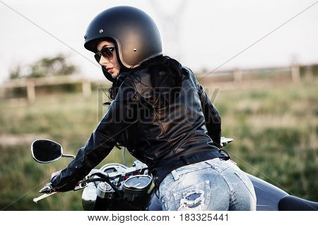 Beautiful Motorcycle Brunette Woman With A Classic Motorcycle (cinema Bleach Bypass Effect)