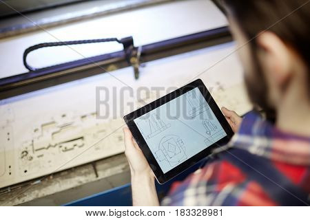 Modern engineer using sketch in touchpad during work