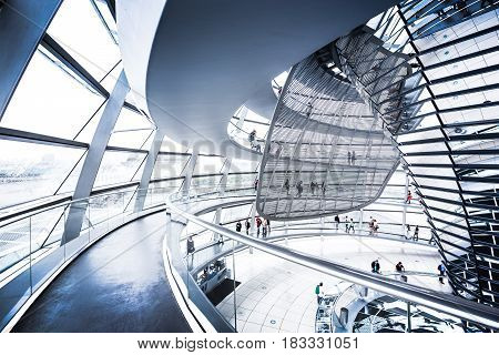 BERLIN - JULY 19: Interior view of famous Reichstag Dome on July 19 2015 in Berlin Germany. Constructed to symbolize the reunification of Germany it's now one of Berlin's most important landmarks.