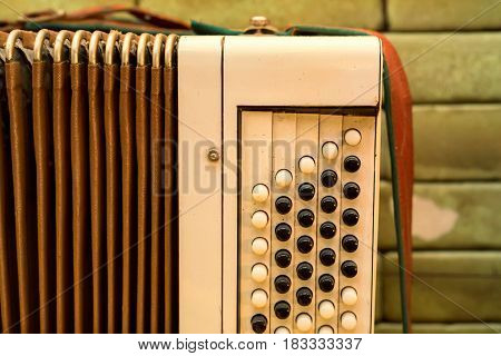 Close-up of old Russian traditional musical instrument bayan