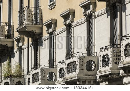Milan (Lombardy Italy): balconies of residential building with potted plants along via Piero della Francesca