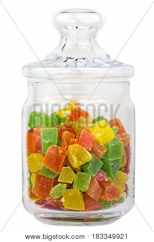 Sweet colorfful turkish delight in closed glass jar isolated on white background, close-up