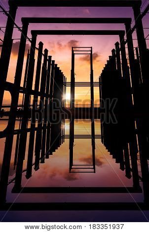 abandon buildings in the sea with sunset