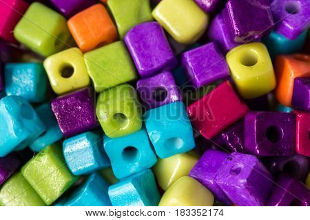 Lot of colorful cubed beads for decoration and handcraft
