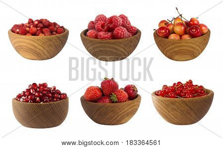 Collage of red fruits and berries isolated on white. Set of strawberries raspberries currants garnets and cherries. Sweet and juicy berry with copy space for text. Ripe berries close-up. Background berry.