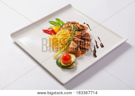 Delicious Chicken Rolls With Cheese And Bacon On A Plate Close-up. Horizontal