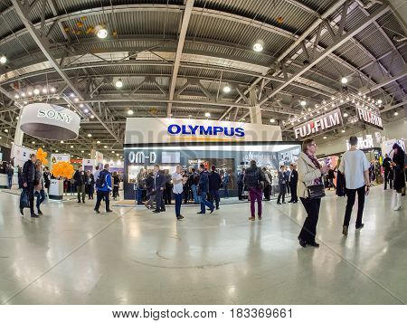 MOSCOW RUSSIA - APRIL 21 2017: Booth of Olympus company at PhotoForum 2017 trade show and exhibition in Moscow Russia on April 21 2017.