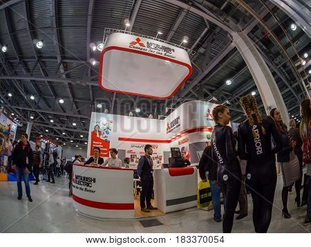 MOSCOW RUSSIA - APRIL 21 2017: Booth of Mitsubishi Electric company at PhotoForum 2017 trade show and exhibition in Moscow Russia on April 21 2017.