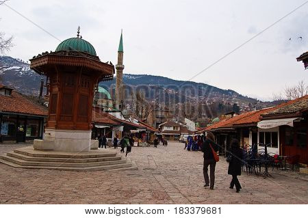 23 may 2009-sarajevo-bosnia-Life on the street of Sarajevo with the fountain of sebilj bosnia