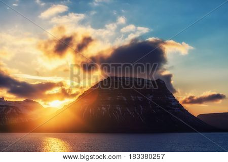 Sunset Behind The Famous Mountain Kirkjufell In Iceland