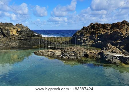 a view of the natural pools of seawater in Charco del Palo, Lanzarote, Canary Islands, Spain