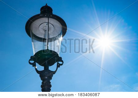Blue sky with street lamp in sunshine detail