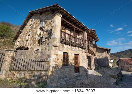 Barcena Mayor village typical stone houses in Cantabria Spain.