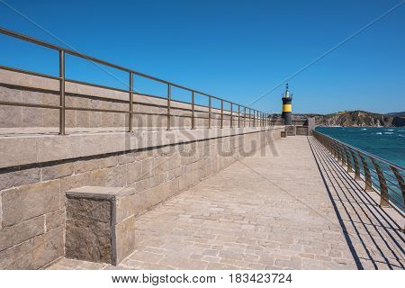 Lighthouse in Comillas port Cantabria Spain .