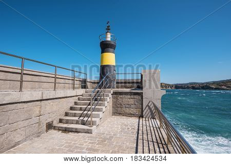 Lighthouse in Comillas port Cantabria Spain .