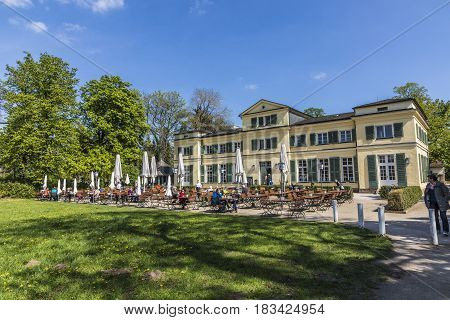 People Enjoy The Summer Day Restaurant In The Restaurant Of Park Of Schoenbusch In Aschaffenburg