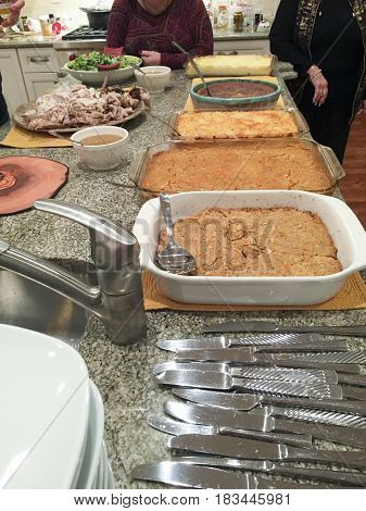 Various Dishes And Casseroles At A Thanksgiving Pot Luck