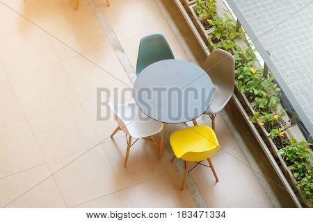 Top View Of Modern Table And Chairs