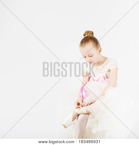 Beautiful Ballet Dancer Isolated On White Background.