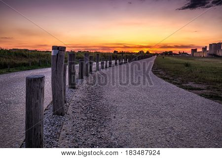 Sunset over the wall in old city Aigues-Mortes, Provence, France.