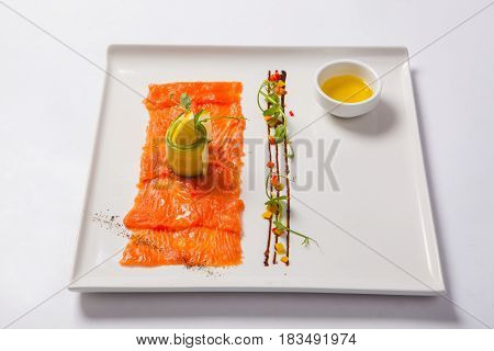 Fish Carpaccio. Carpaccio Of Salmon On White Plate