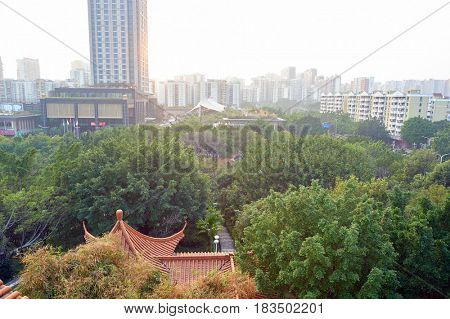 SHENZHEN, CHINA - MARCH 01, 2016: view of Longgang District from the park in the daytime. Longgang District is one of the six districts of Shenzhen, China.