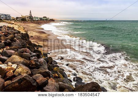 Waves and the coastline of Swakopmund German colonial town Namibia