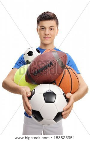 Teenage athlete with different kinds of sports balls isolated on white background