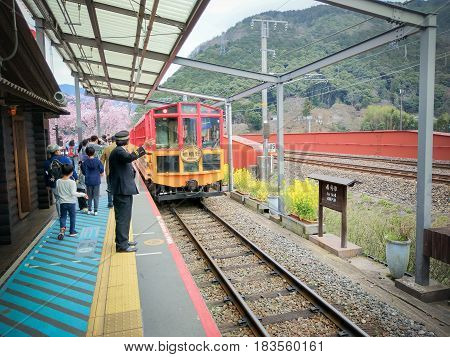SAGONO RAILWAY, KYOTO, JAPAN - April 6, 2017 : Sagano Scenic Railway (Romantic Train) is Best Sightseeing Train Line Runs Along the Hozugawa River between Kameoka.