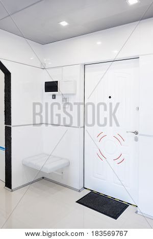 Modern home hallway interior. White plactic panels and tiles. Futuristic interior concept design. Space ship at home