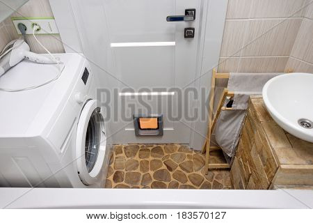 Small modern bathroom interior. Well organized space.