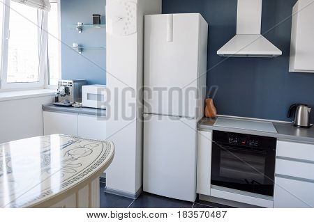 Interior of modern kitchen in a spacious apartment.
