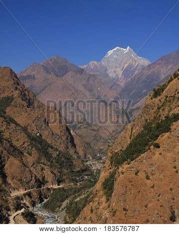 Distant view of Tatopani and mount Nilgiri. Popular place with natural hot spring. Annapurna Conservation Area Nepal