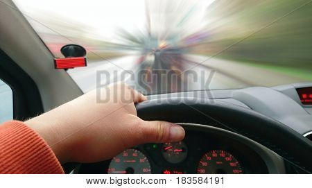 First Person View of Driver Behind the Wheel During Driving a Car. Point of View Shot of Driving a Car. Drivers POV shot.
