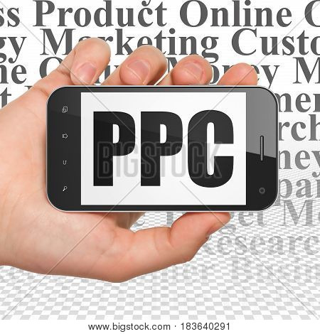 Advertising concept: Hand Holding Smartphone with  black text PPC on display,  Tag Cloud background, 3D rendering