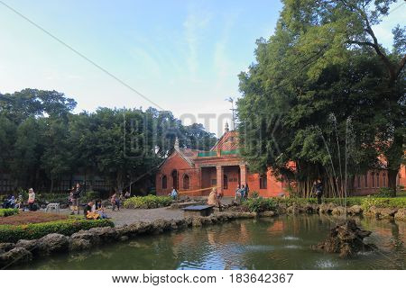 TAIPEI TAIWAN - DECEMBER 4, 2016: Unidentified people visit Oxford Aletheia University in Tamusi. Aletheia University was founded by George Leslie Mackay as Oxford College in 1882.