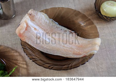 Fillet Is Fresher Than Fish On A Plate On A Gray Background